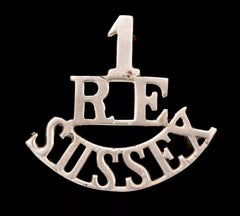 1.R.E Sussex Shoulder Title White Metal