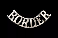 Border Shoulder Title White Metal