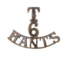 T 6 Hants Shoulder Title Brass Metal