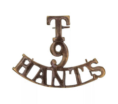T.9 Hants Shoulder Title Brass Metal
