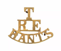 T R.E Hants Shoulder Title Brass Metal