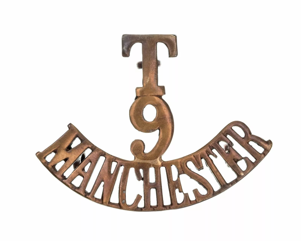 T 9 Manchester Shoulder Title Brass Metal