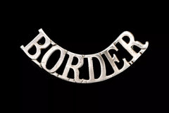 Border Shoulder Title White Metal