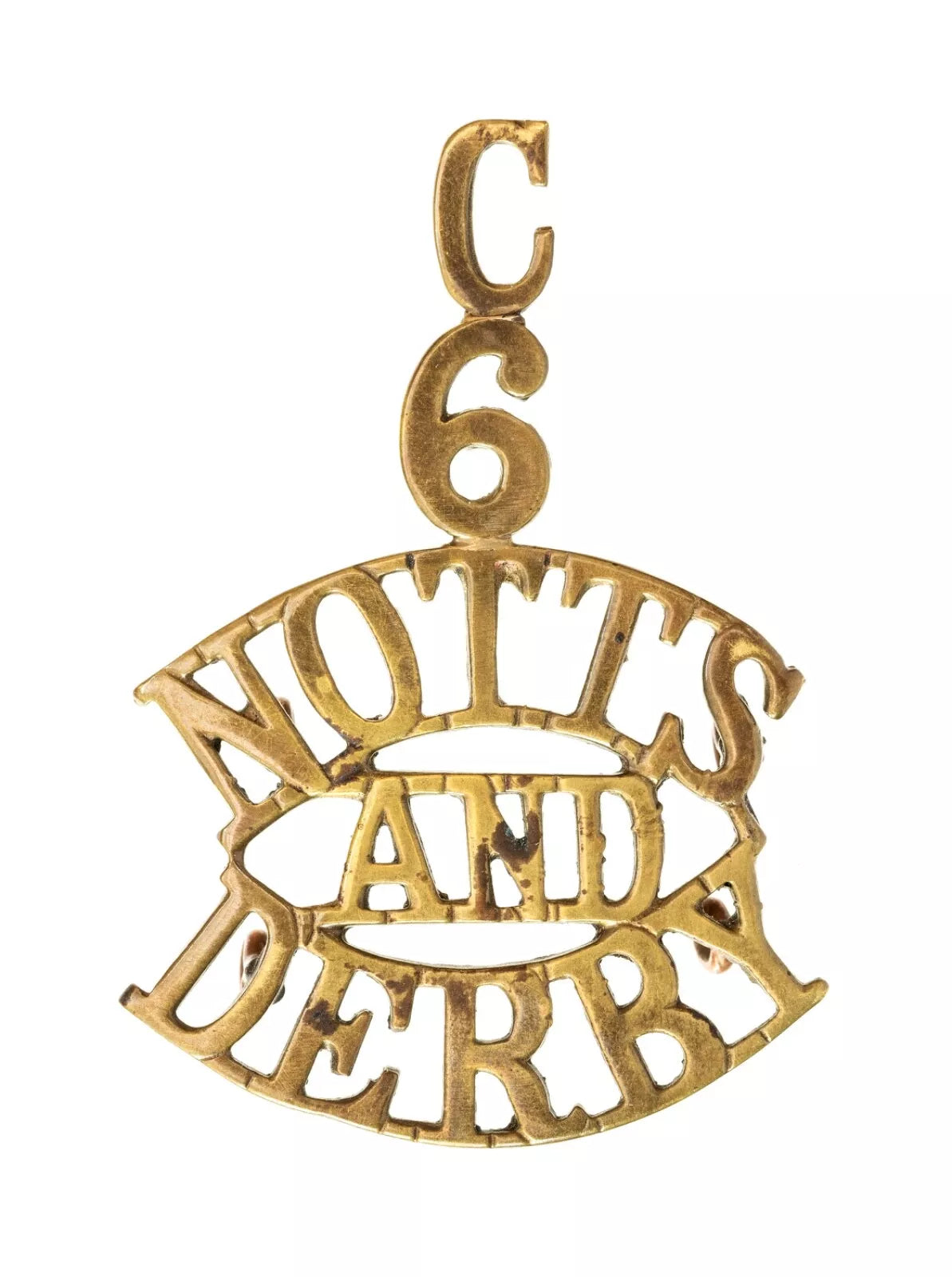 C.6 Notts And Derby Shoulder Title Brass Metal
