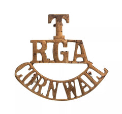 T R.G.A Cornwall Shoulder Title Brass Metal